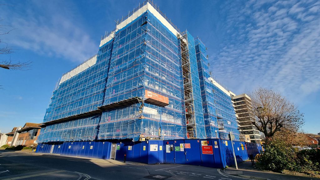 Scaffolding surrounding the Empress Heights building. Photo taken from the ground.