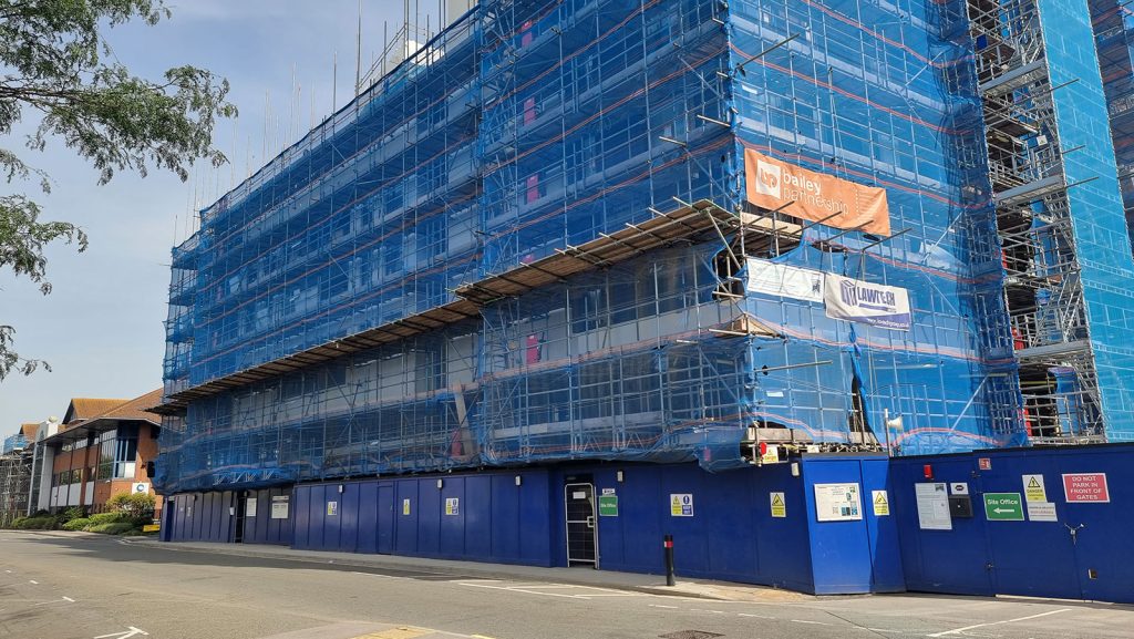 Scaffolding surrounding the Empress Heights building. Photo taken from the ground.